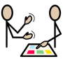 Two people facing opposite one is pointing to a sheet of paper with different colours the other is clapping his hands
