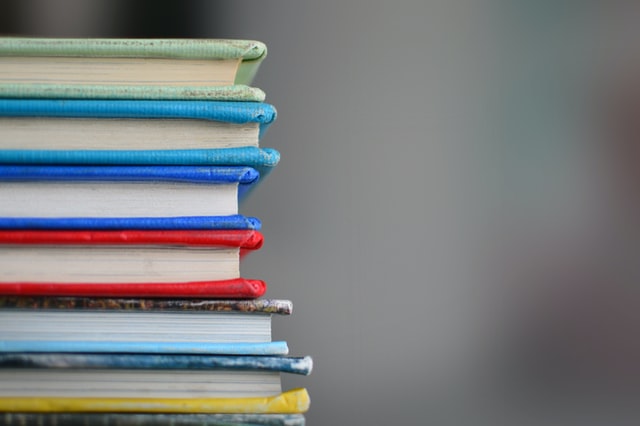 A stack of colourful books