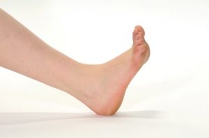 Photograph of foot flexing back towards ankle to feel a pull in the top of the foot