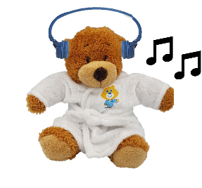 Photograph of Theo bear listening to music