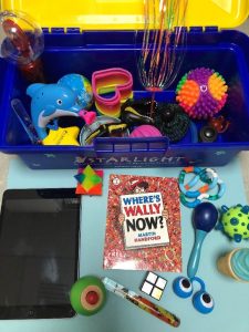 Photograph of play items and toy box